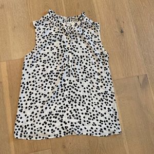 White and black sleeveless blouse from LOFT